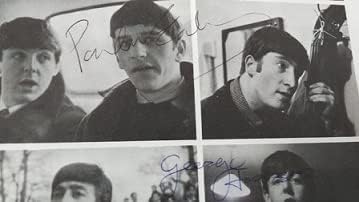 Uokvirena stranica časopisa George Harrison i Paul McCartney Autograph Magazine sa certifikatom o autentičnosti
